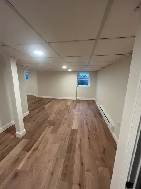Basement Conversion — Recessed lighting and flooring