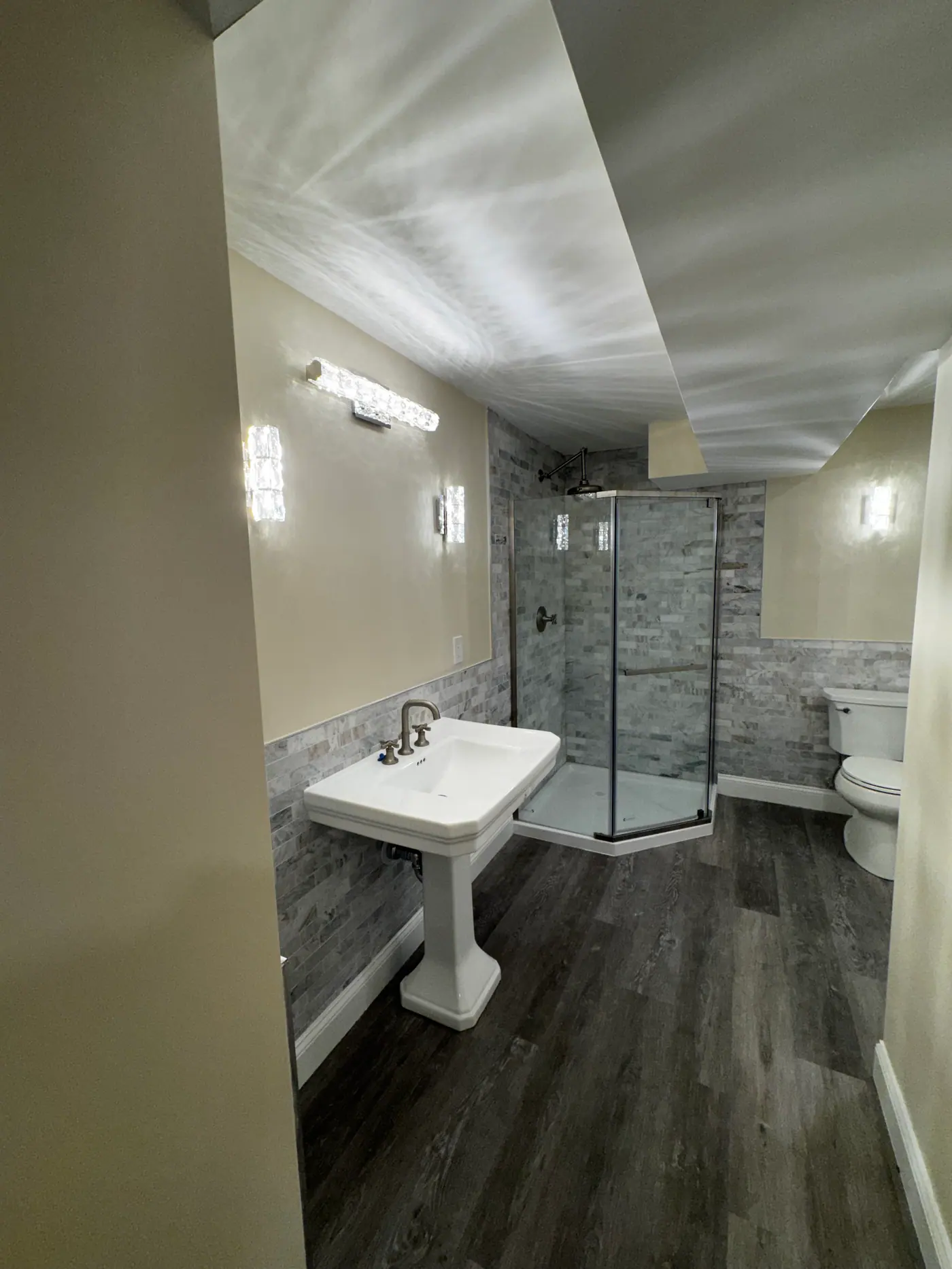 Corner Shower Bathroom — Frameless glass and stone tile