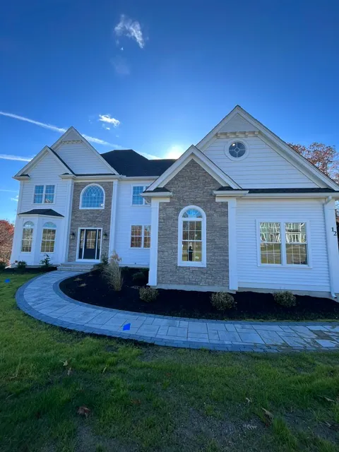 Colonial with Stone — Stone veneer and paver walkway