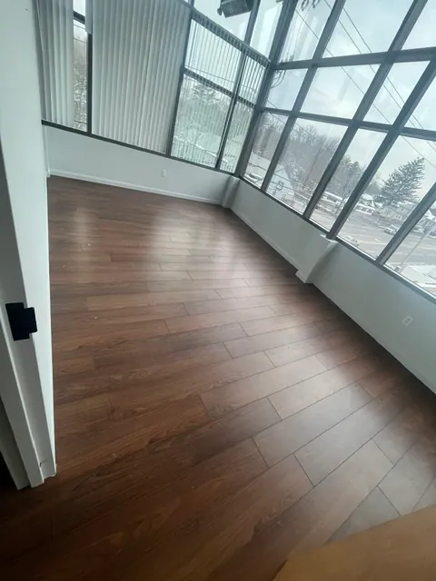 Sunroom Flooring — Wide-plank installation