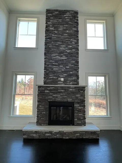 Stone Fireplace — Floor-to-ceiling stonework