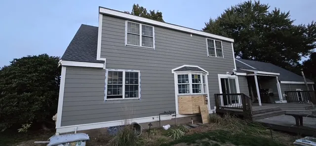 Rear Addition — Siding, trim and entry